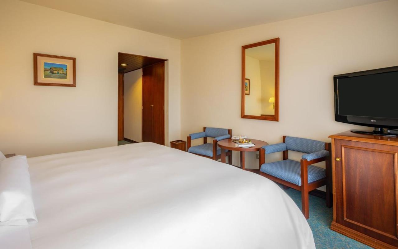 Ghl Hotel Lago Titicaca Puno Exterior photo A room at the hotel