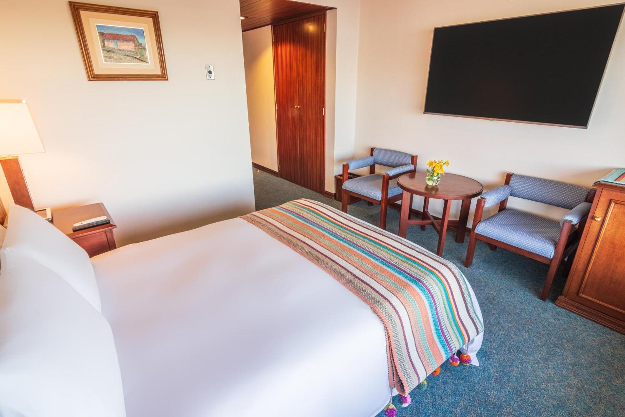 Ghl Hotel Lago Titicaca Puno Exterior photo A room at the hotel