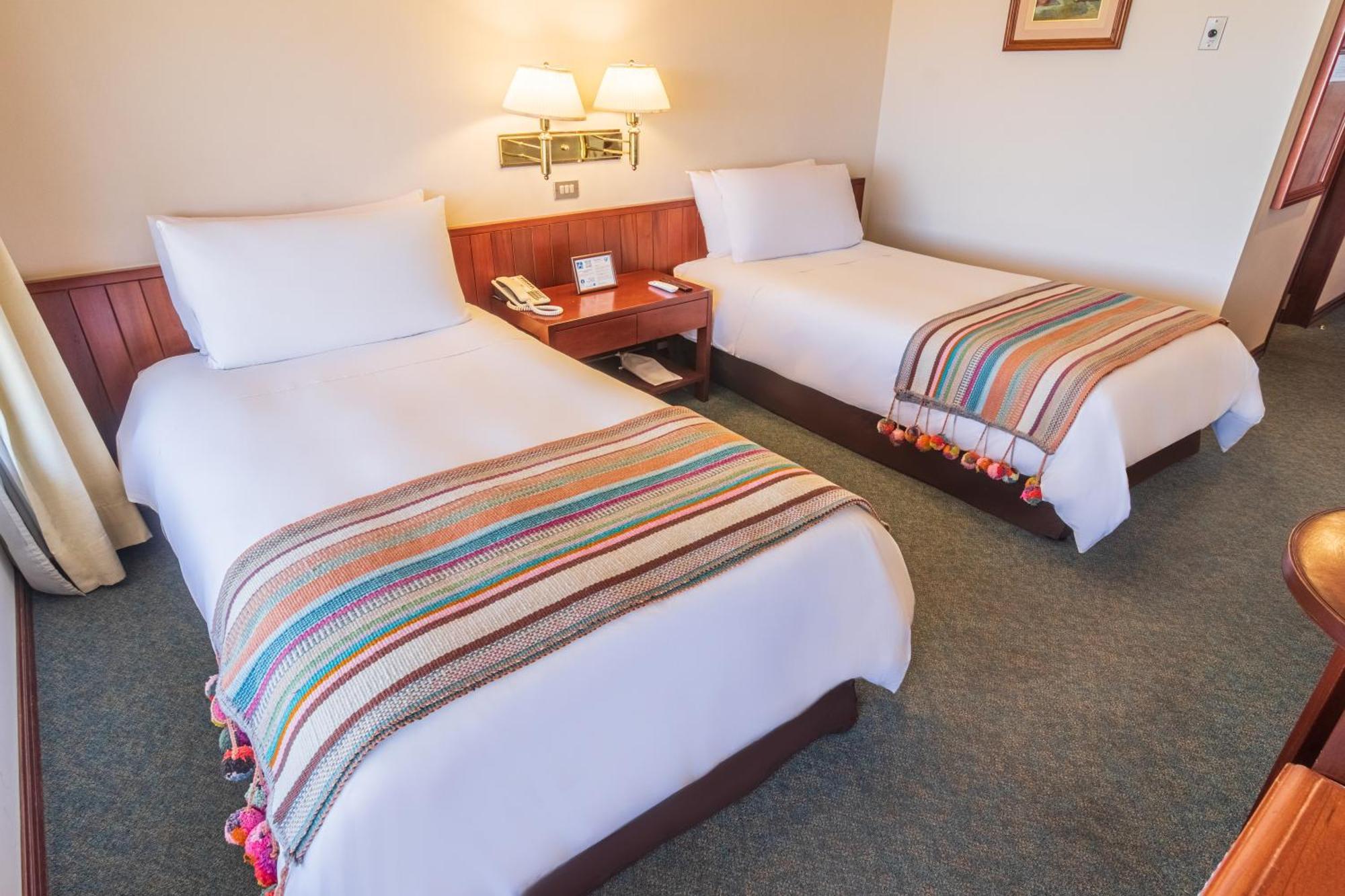 Ghl Hotel Lago Titicaca Puno Exterior photo A guest room at the Hotel El Prado