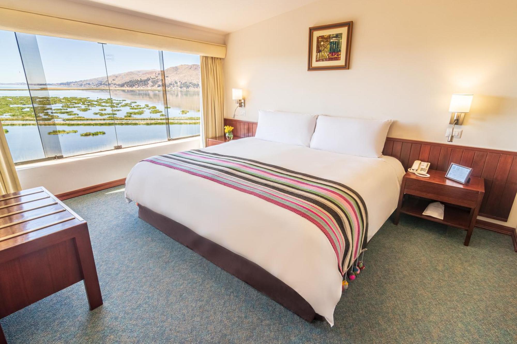 Ghl Hotel Lago Titicaca Puno Exterior photo A room at the hotel