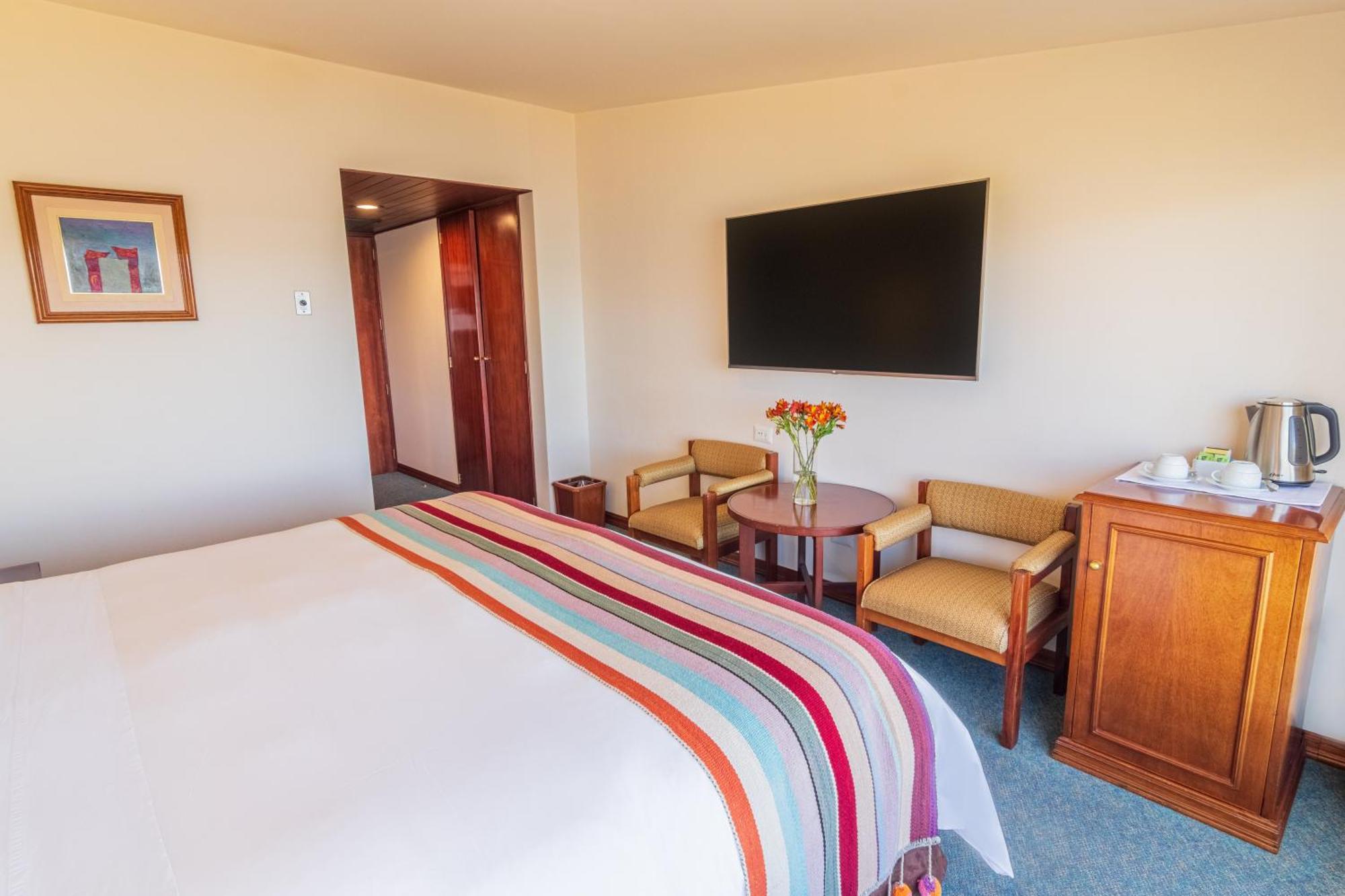 Ghl Hotel Lago Titicaca Puno Exterior photo A room at the hotel